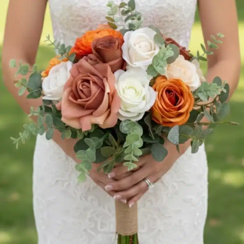 Elegant White Rose Wedding Flowers With Orange & Caramel Bridal Bouquet
